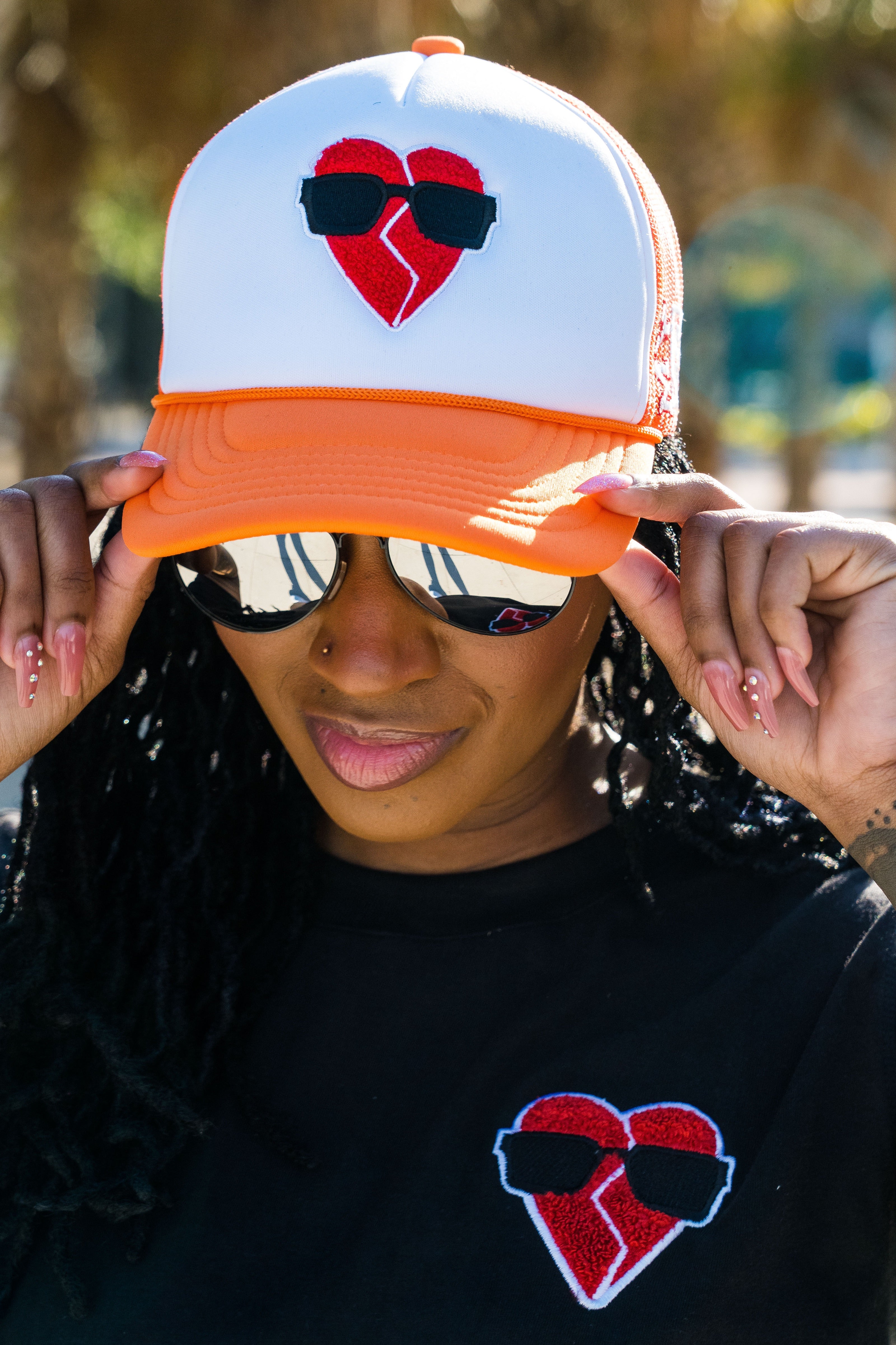 MYFA SnapBack Trucker Hat: Orange/Red Logo