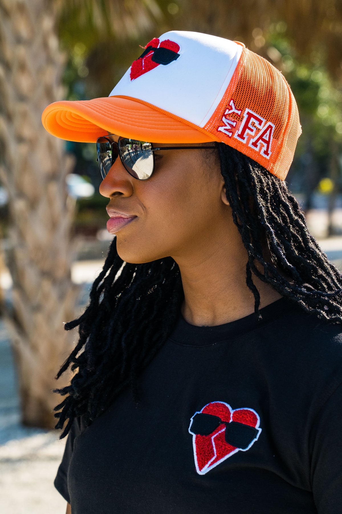 MYFA SnapBack Trucker Hat: Orange/Red Logo